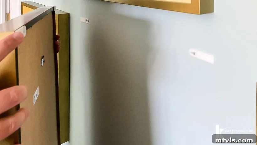 Bright DIY Memory Wall 9 Hanging photos with Command picture hanging strips for a secure gallery wall