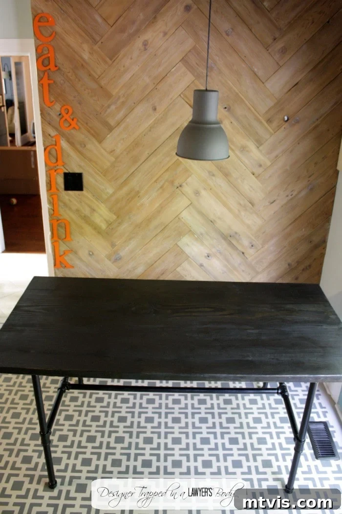 Crafting Your Own Pipe Table 8 Stunning finished DIY Industrial Pipe Dining Table in a modern kitchen setting, highlighting its design