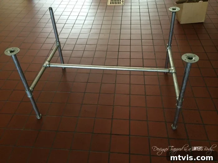 Crafting Your Own Pipe Table 4 Step-by-step assembly of the sturdy DIY Industrial Pipe Table legs, showing connections