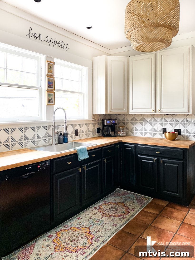 Backsplash Makeover Paint Your Tiles Like a Pro in 5 Steps 13 DIY painted and stenciled backsplash in a bright kitchen