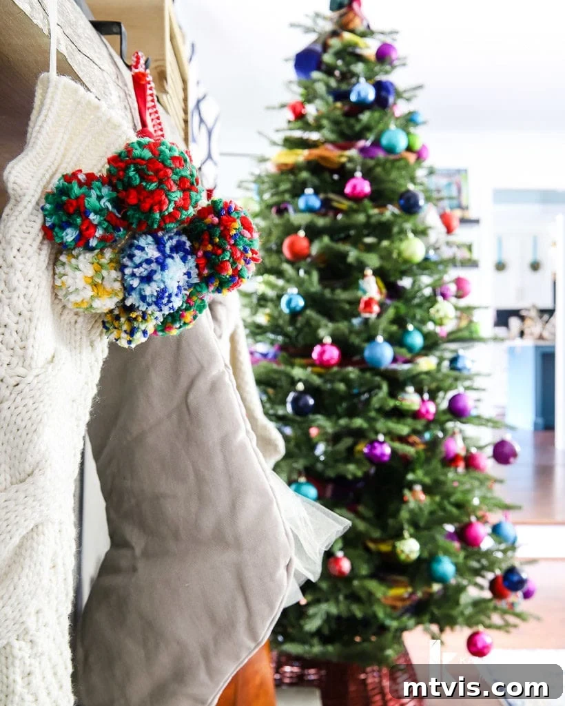 Radiant Yuletide Splendor 7 pom pom stocking with colorful Christmas tree in background