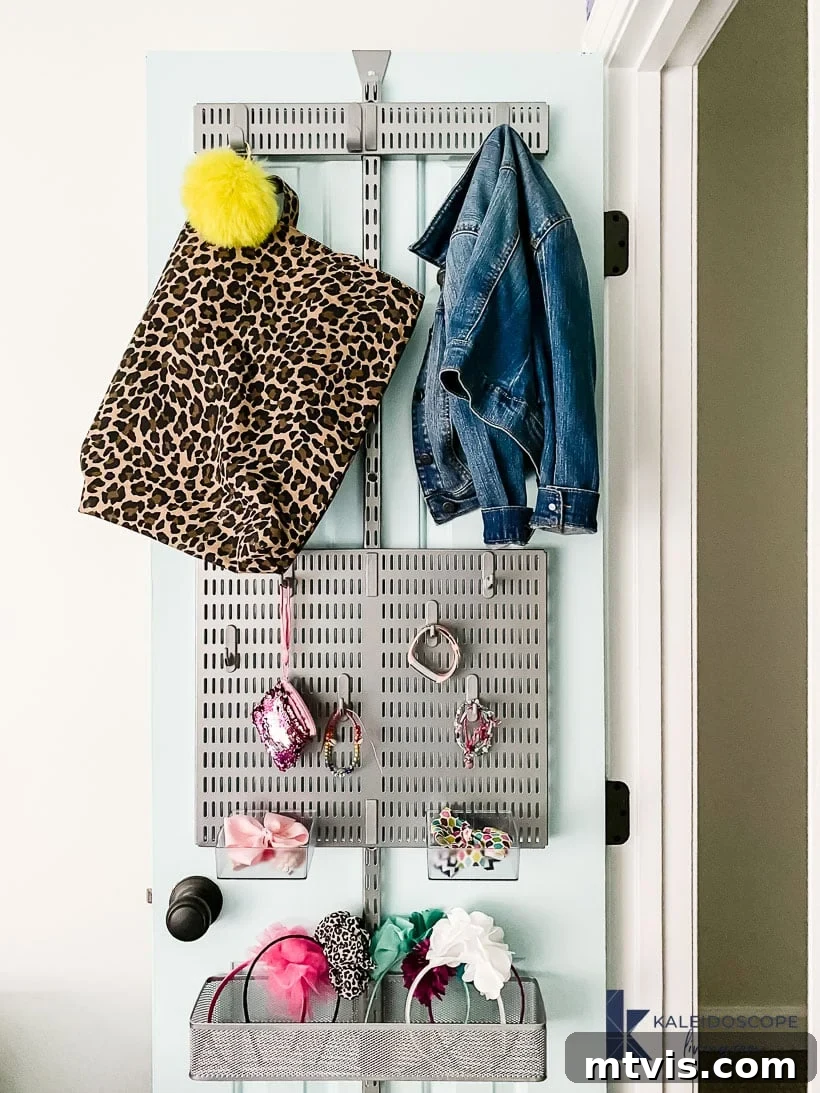 Vertical Victory Back of Door Organization 5 Close-up of organized closet door with various accessories in Elfa baskets.