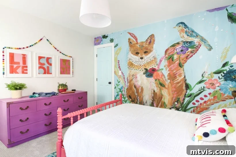 Colorful girl's bedroom showcasing a magnificent fox wall mural as a backdrop for a restored purple dresser adorned with simple artwork, providing inspiring kids' room decor ideas.