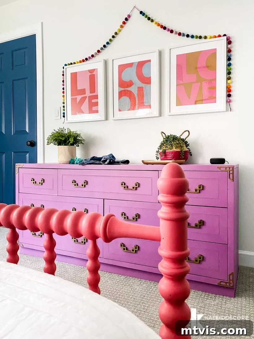 Full perspective of Attley's colorful girl's bedroom, highlighting the purple dresser, vibrant fox mural, and eclectic accessories, offering a wealth of creative kid's room decor inspiration.