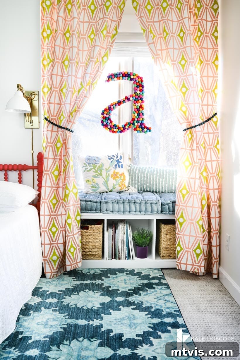 Panoramic view of Attley's colorful girl's bedroom, capturing the cozy window seat, vibrant bedding, and imaginative wall decor, perfect for inspiring a dream kid's room makeover.