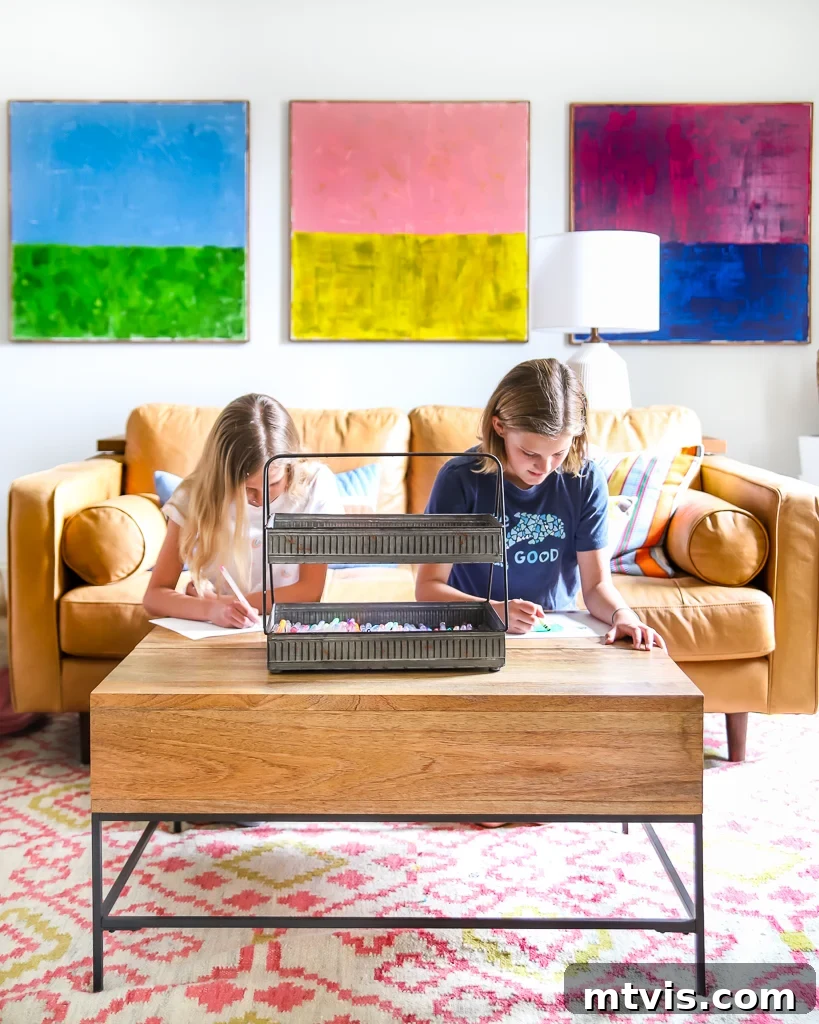 Transform Your Playroom: Simple Storage for a Clutter-Free Zone 11 A vibrant playroom with a desk area, showcasing organized art supplies in a portable caddy, emphasizing flexible storage solutions.