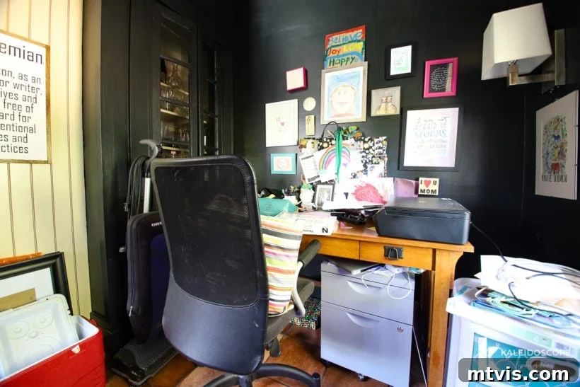 Thea Workspace Transformed 5 Before shot of a dark office with hidden built-in cabinet