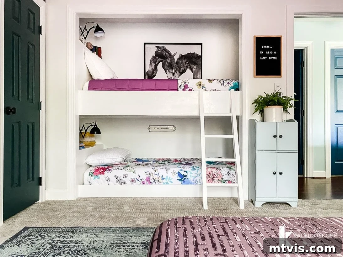 The Big Reveal: Avery's Bespoke Bunk Bed Room 5 A girl's bedroom with built-in bunkbeds in a closers nook.