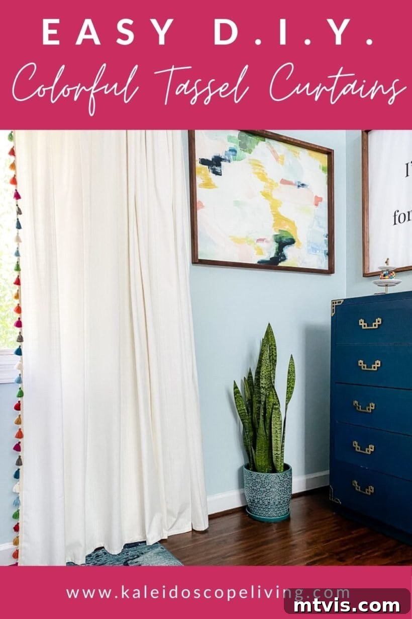 Stunning white curtain panels adorned with vibrant, colorful tassel trim, showcasing a high-end custom look.