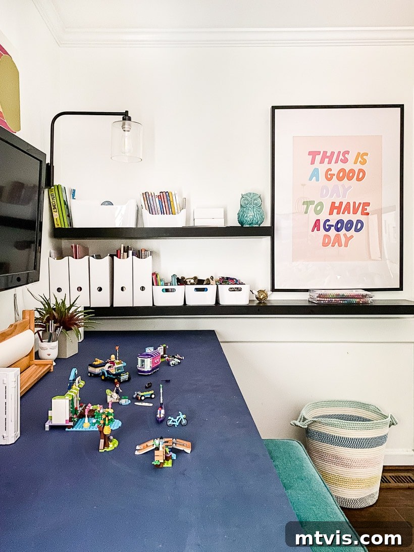 Our Home's Canvas of Color 12 colorful wall art in playroom