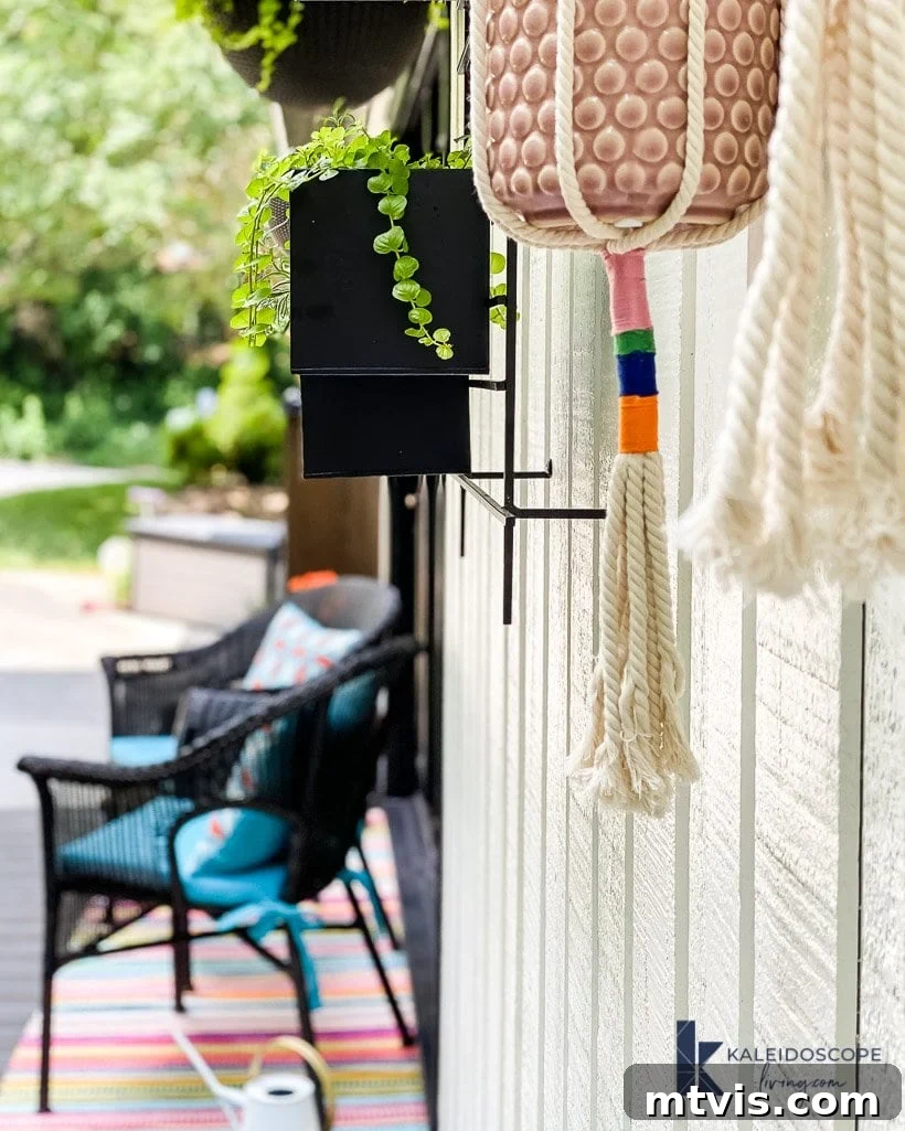 Knot Your Own Macrame Plant Hanger 7 Close-up of finished DIY macrame plant hangers with colorful wrapped sections and tassels.