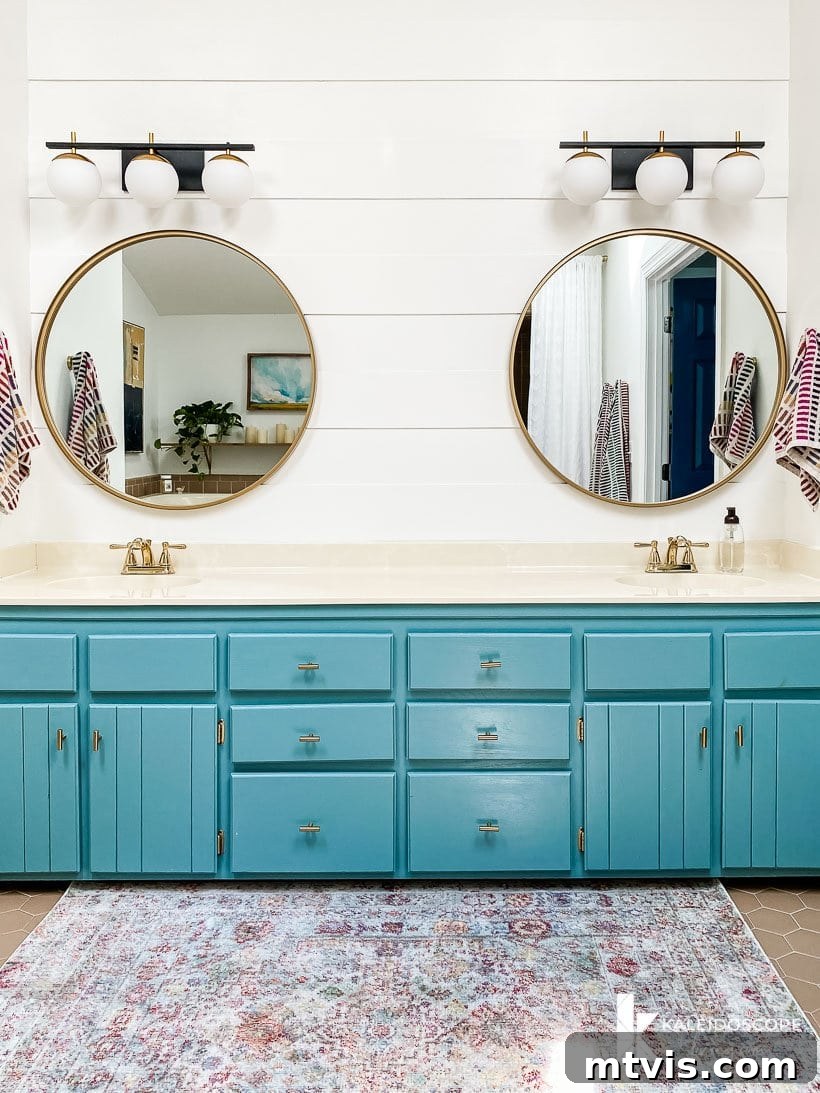 Master Bathroom Remodel on a Budget The Big Reveal 11 affordable master bathroom remodel vanity - A close-up view of the updated vanity area, highlighting the new faucets and decor.