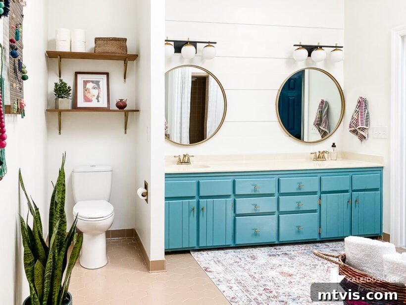 Master Bathroom Remodel on a Budget The Big Reveal 12 master bathroom remodel affordable - A broader view of the vanity wall, showing the plank wall and overall modernized aesthetic.