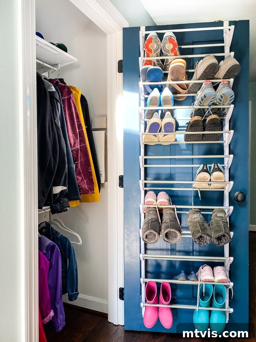Declutter Your Coat Closet: The 100 Dollar Edition 5 organized coat closet with door-mounted shoe rack