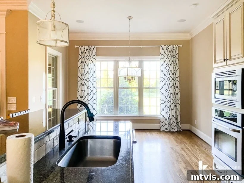 Our New House: The Blank Canvas Tour Part 1 11 Kitchen leading into a bright breakfast nook with large windows