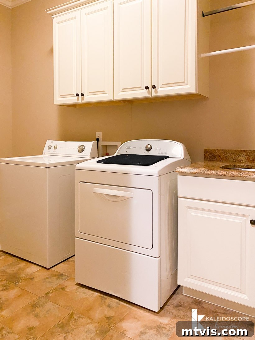 Our New House: The Blank Canvas Tour Part 1 25 Laundry room with tile flooring and space for appliances