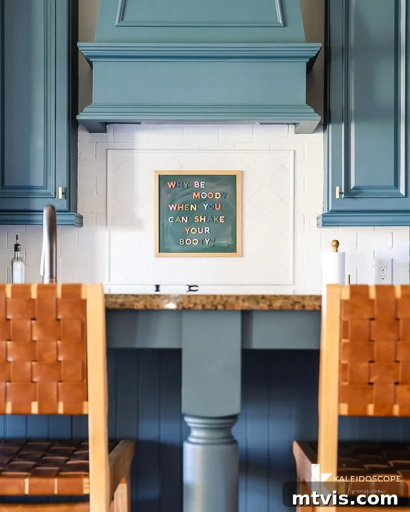 Our Jaw-Dropping Kitchen Reno - Done on a Dime! 11 kitchen cabinets painted with Fusion Mineral Paint in Seaside