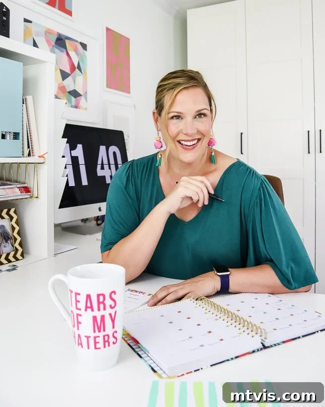Completing Home Projects on a Hectic Schedule 5 Tasha Agruso of Kaleidoscope Living at desk