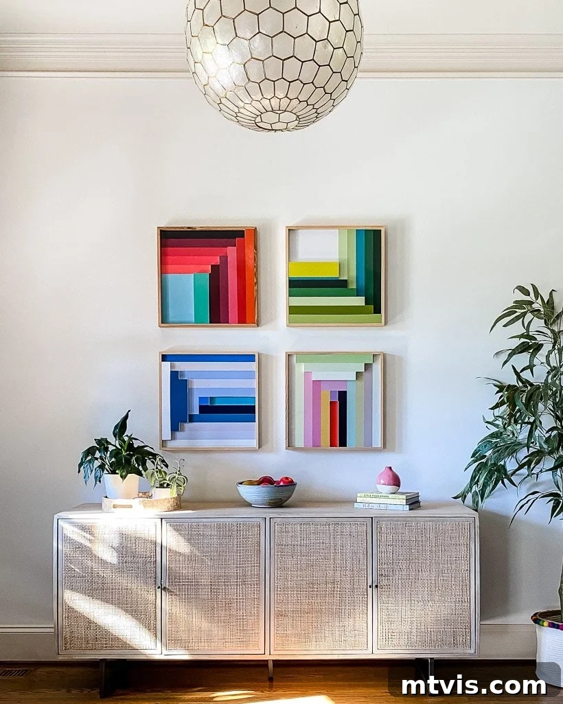 Transform Your Space: The Ultimate Guide to Large Wall Art 8 Colorful graphic art arranged in a gallery style in an entryway, showing balanced sizes.