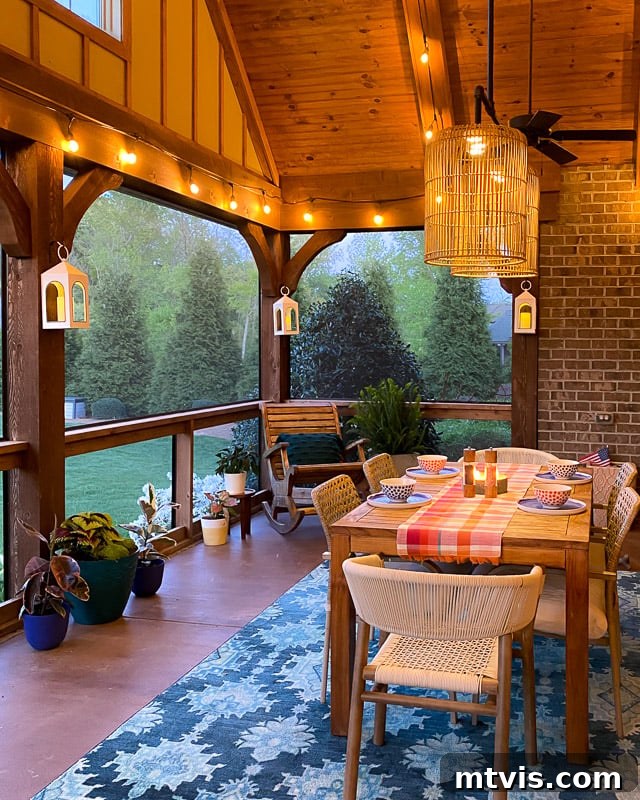 Outdoor Oasis: Screened Porch Tour & Decor Tips 10 Screened-in porch at night, adorned with string lights for a magical evening setting.