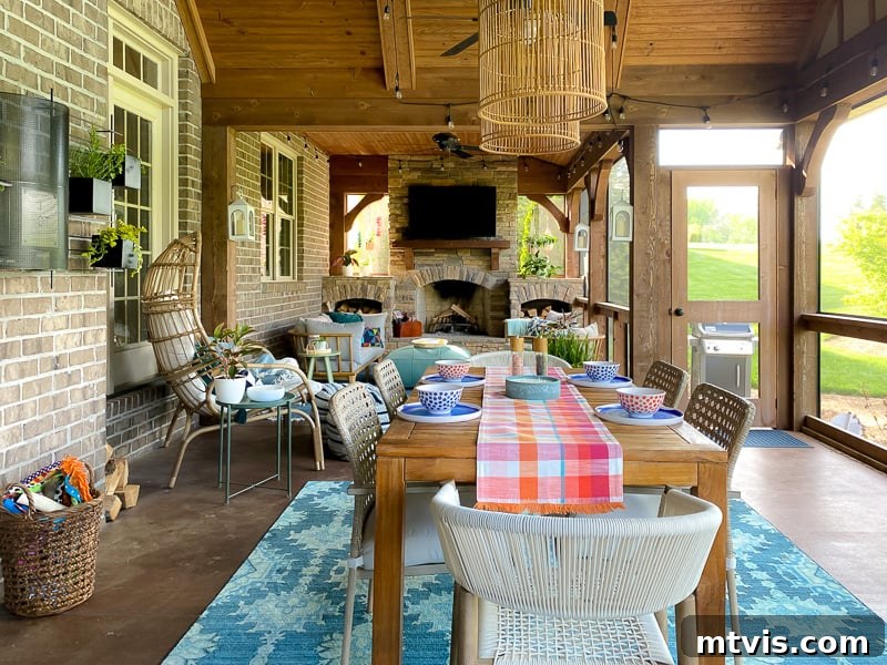 Outdoor Oasis: Screened Porch Tour & Decor Tips 4 Vibrant and comfortable covered patio, perfectly set up for daily use and relaxation.