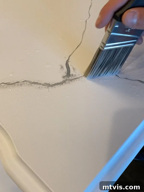Paint Your Countertops Like a Pro: Essential Tips for a Flawless Finish 13 creating painted marble effect on granite countertops by Tasha Agruso of Kaleidoscope Living