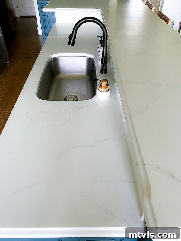 Paint Your Countertops Like a Pro: Essential Tips for a Flawless Finish 29 granite countertops painted to look like honed marble by Tasha Agruso of Kaleidoscope Living