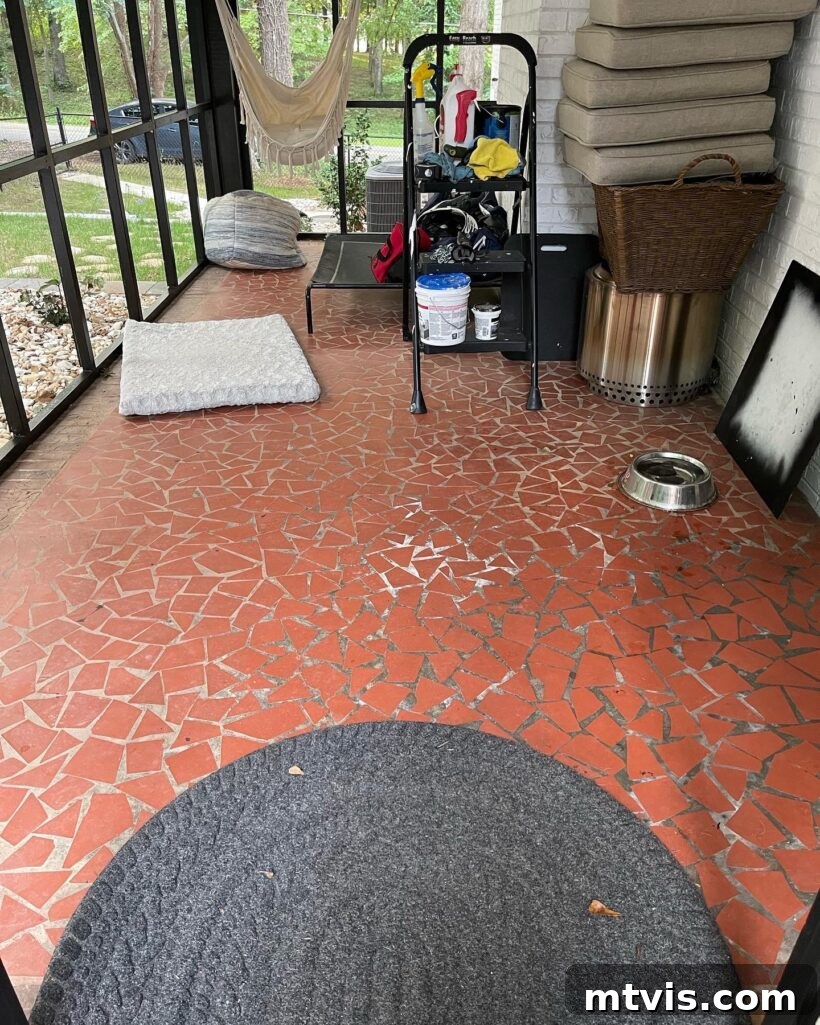 Designer in a Binder: Customer Success Stories 20 Before photo of Kristen's outdated screened-in porch floor
