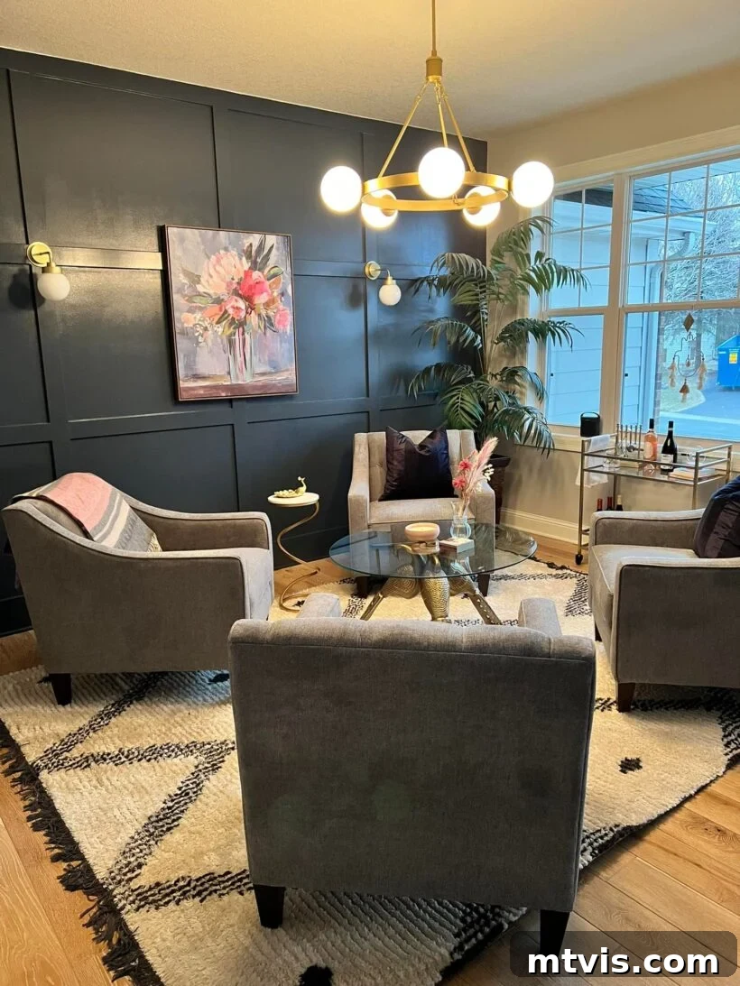 Designer in a Binder: Customer Success Stories 35 After photo of Nancy's chic lounge with board and batten and new light fixture
