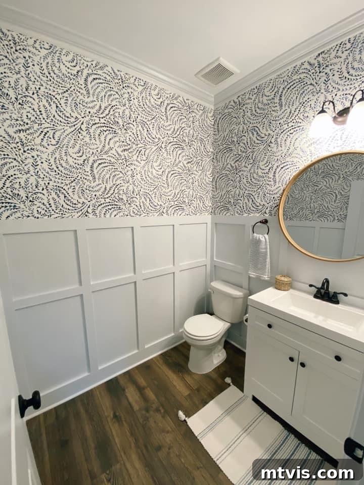 Designer in a Binder: Customer Success Stories 5 After photo of Brooke's elegant bathroom with board and batten and patterned wallpaper