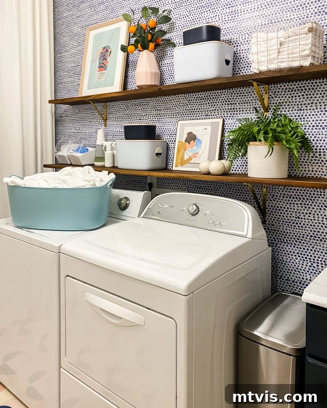 Unveiling Our Chic Modern Laundry Oasis 8 colorful laundry room with open walnut shelving and decor