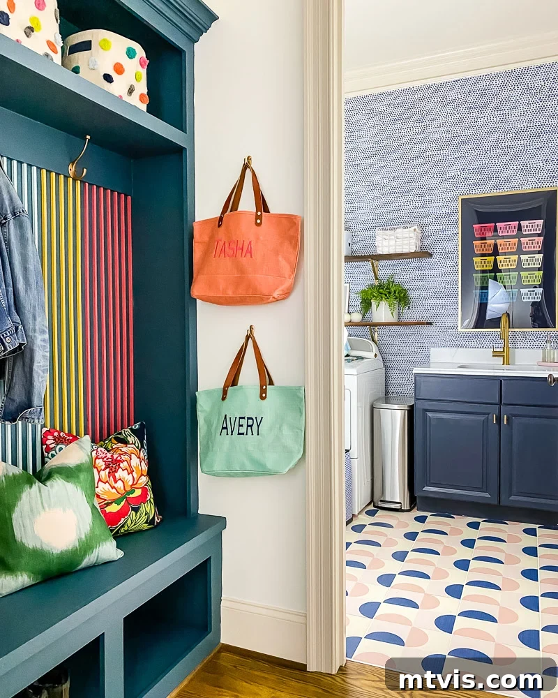 Modern Wood Slat Wall Transformation 12 Seamless transition between the colorful mudroom and the bright laundry room, demonstrating cohesive home design