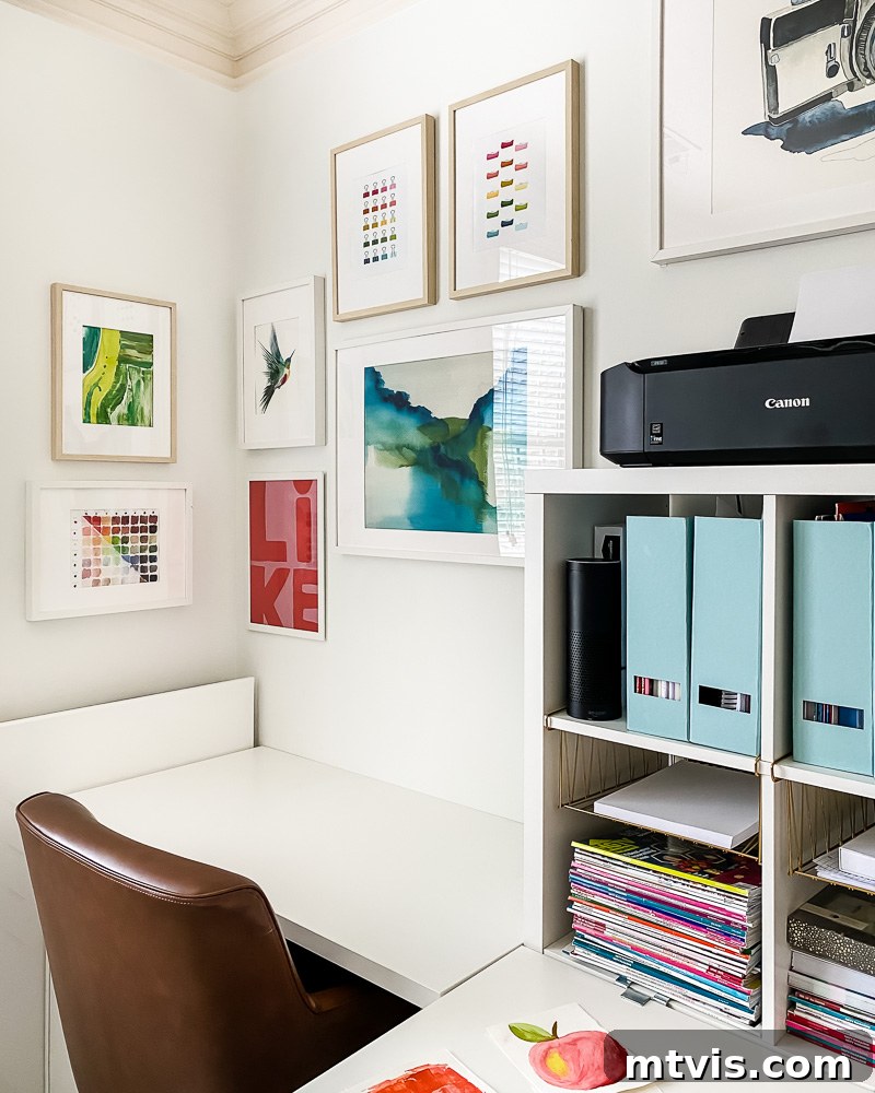 Seamless Spaces: Discover Our Gallery of Flowing Colors 14 Vibrant office gallery wall featuring a mix of graphic prints, abstract watercolors, and text art.