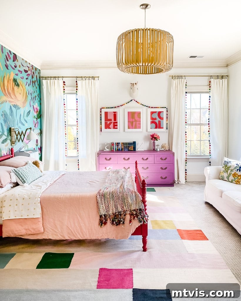 Seamless Spaces: Discover Our Gallery of Flowing Colors 21 Girl's room with a vibrant mural and three colorful prints that are also featured in the office.