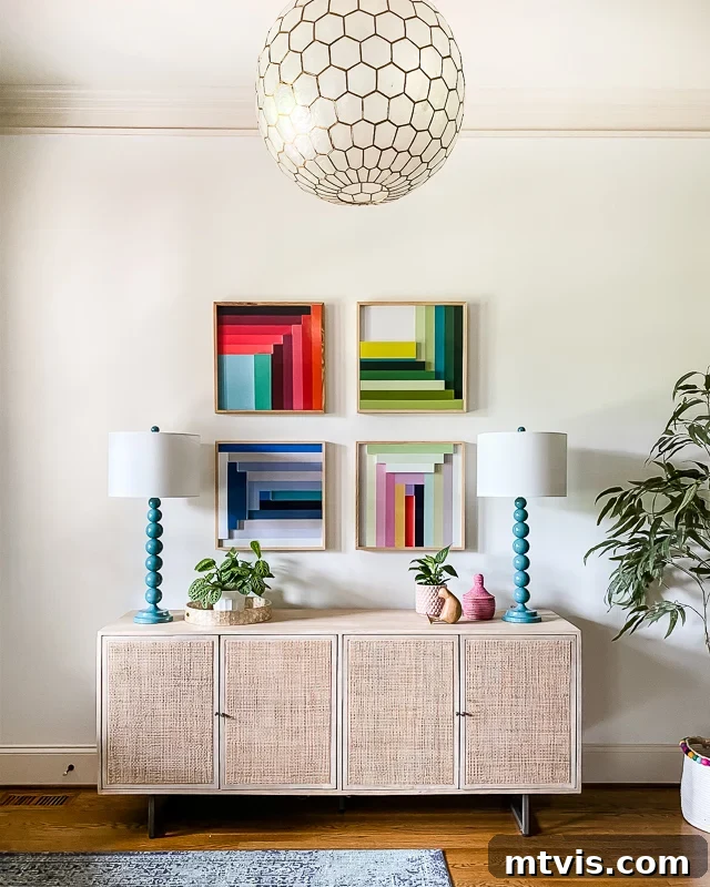 Seamless Spaces: Discover Our Gallery of Flowing Colors 5 Dynamic colorful graphic art piece in a modern entryway, setting the tone for the home's art collection.