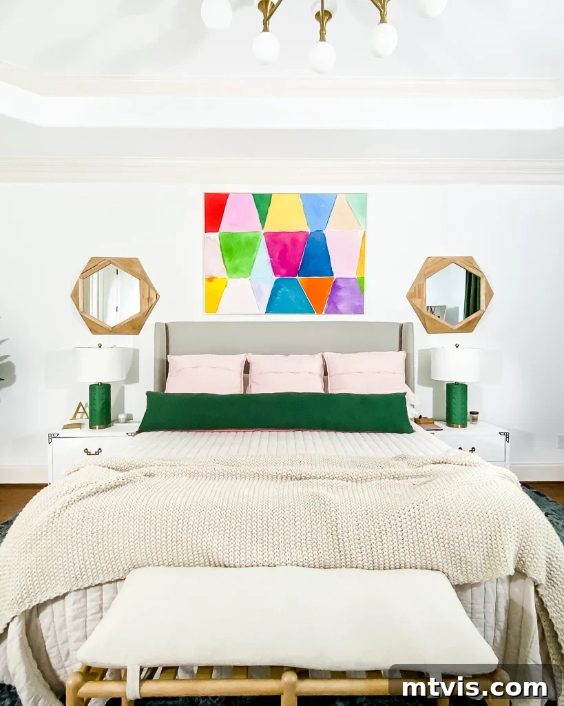 Seamless Spaces: Discover Our Gallery of Flowing Colors 7 Vibrant abstract art pieces creating a focal point in a modern primary bedroom.