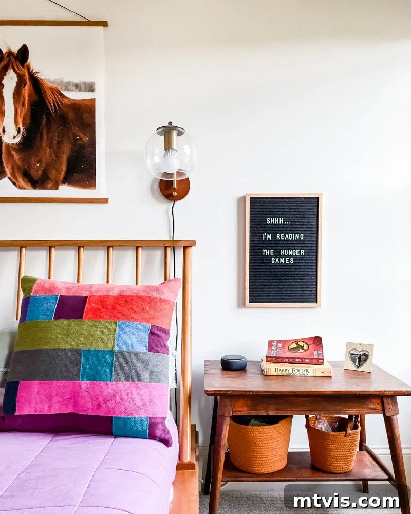 Another perspective of Avery's mid-century modern bedroom, highlighting the seamless integration of furniture and decor to create a harmonious atmosphere.