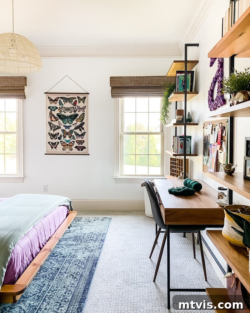 Detailed view of the mid-century modern bedroom decor, featuring vibrant purple and green accents, and curated accessories that reflect a tween's personality.