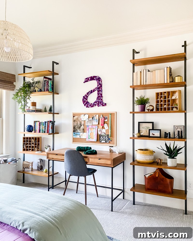 Full view of Avery's mid-century modern bedroom, featuring a cohesive design with purple and green colors, and stylish furniture.