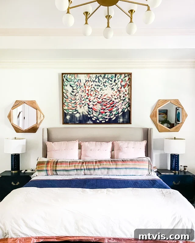 Our Primary Bedroom Design Dilemmas 2 Before: Dark navy primary bedroom with blue bedding and heavy decor