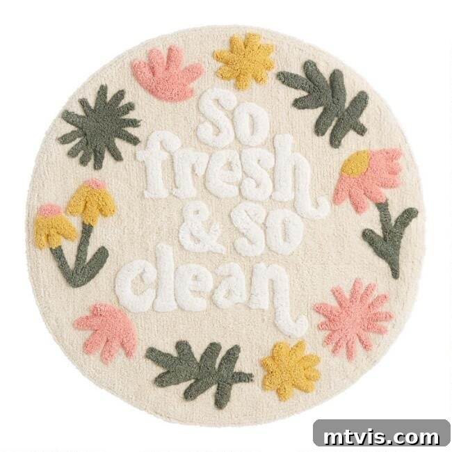 Splash of Style: Top Bath Mats for Bright Bathrooms 4 A charming round cream-colored bath mat featuring bold, colorful floral illustrations along its border and the cheerful text, "so fresh and so clean," at its center. This mat is perfect for adding a fun and inviting touch to any bathroom.