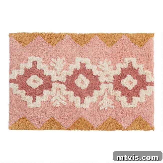 Splash of Style: Top Bath Mats for Bright Bathrooms 7 An overhead product photo of a budget-friendly, rectangular bath mat featuring a blush and mustard floral Aztec pattern, perfect for adding stylish color to any bathroom without breaking the bank.