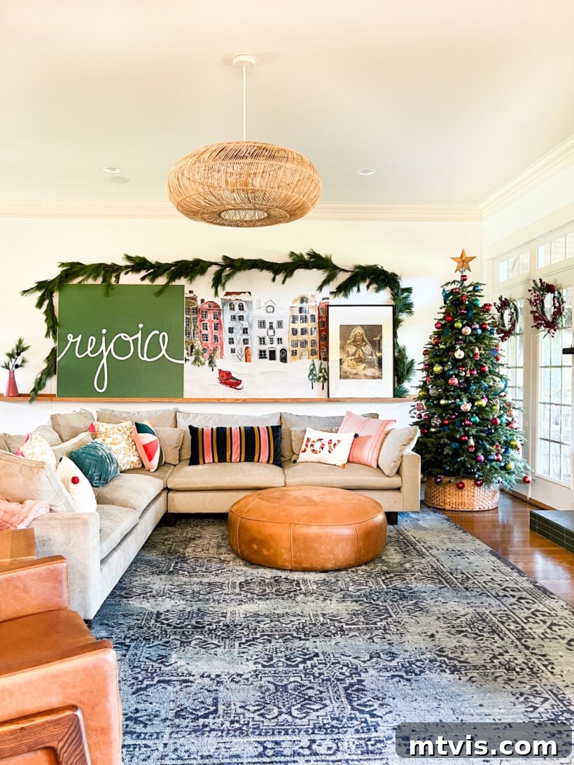 DIY 'Rejoice' Christmas art glowing magically in a family room