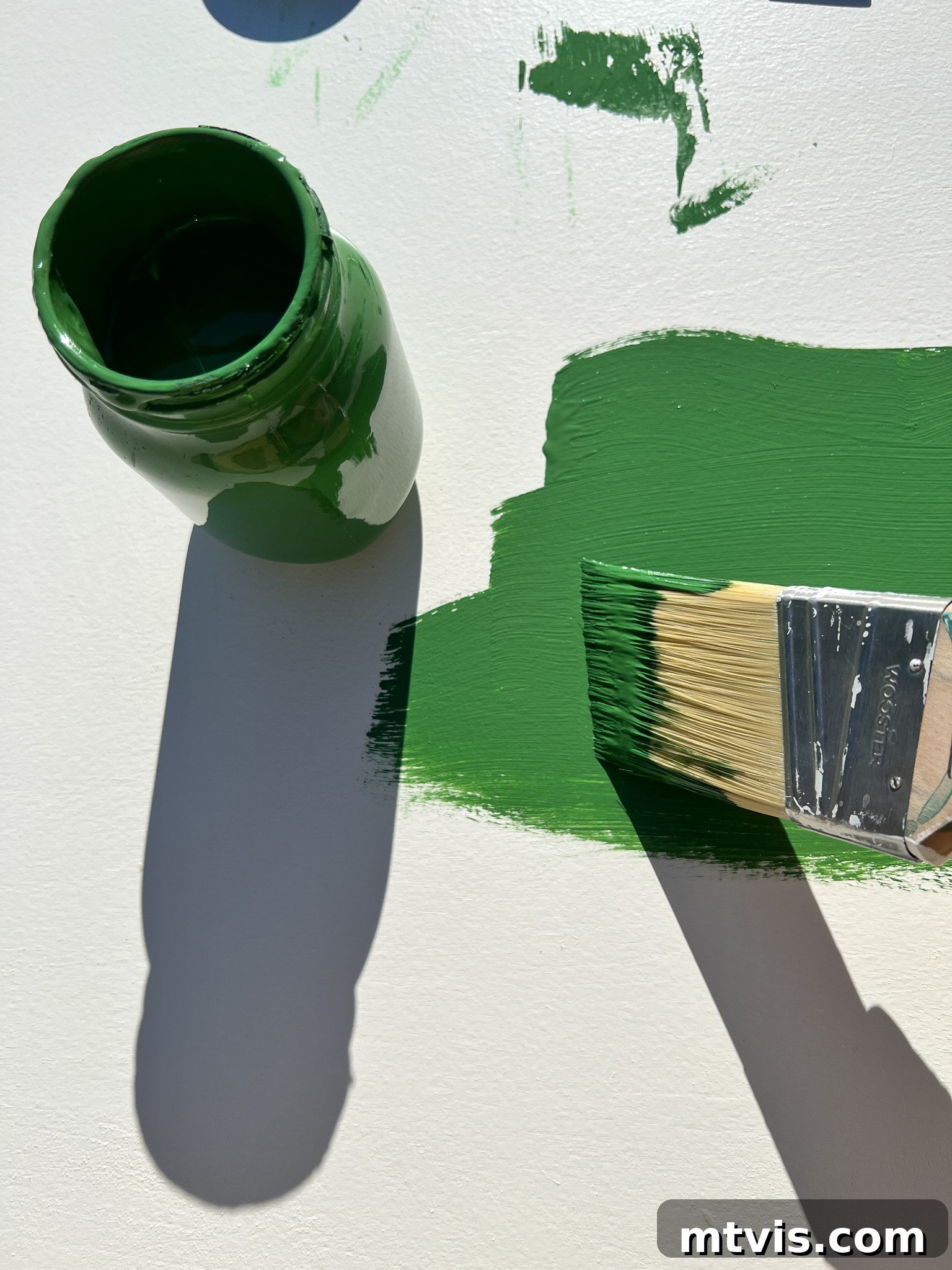 Plywood painted green, ready for the next step in making light-up wall art