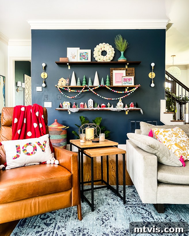 A Spectrum of Holiday Cheer: Our 2021 Christmas Home Tour 14 Christmas home tour featuring a family room with festive shelves and holiday decor.