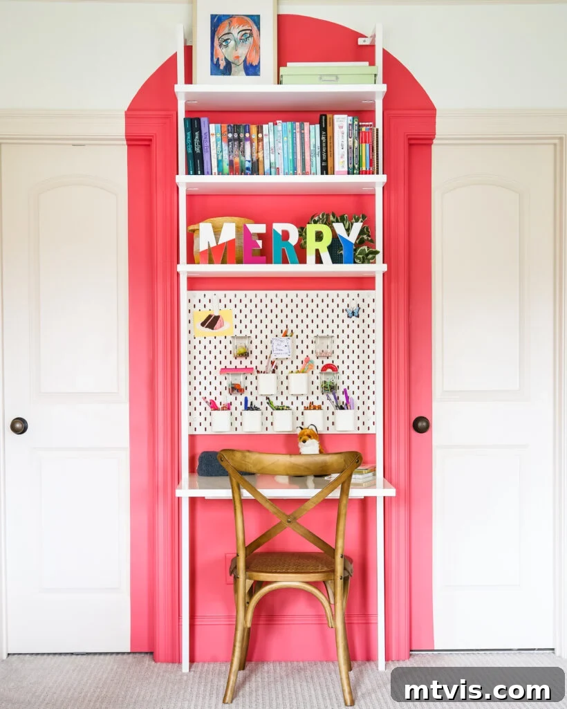 Attley's desk bookcase adorned with 'MERRY' letters for Christmas.