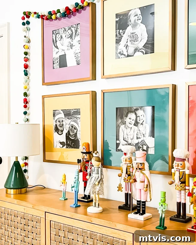 Close-up of the nutcracker collection and framed Christmas memories on the landing.