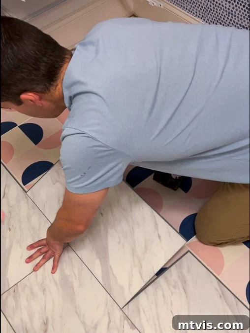 Install a Floating Tile Floor Like a Pro 8 Completed floating tile floor in a laundry room