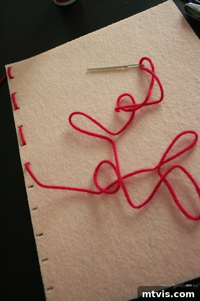 Felt Doll Magic: Create Your Own Playtime Friends 9 Hands demonstrating how to stitch two pieces of stiff felt together with yarn and a needle, forming the spine of the felt dress-up doll book.