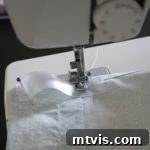Upcycle Sheets into Stylish Curtains 7 GENIUS! Learn how to make curtains out of sheets! Full tutorial by Designer Trapped in a Lawyer's Body.